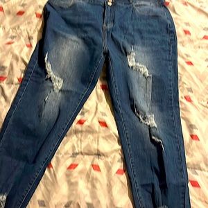 Dark blue ripped jeans